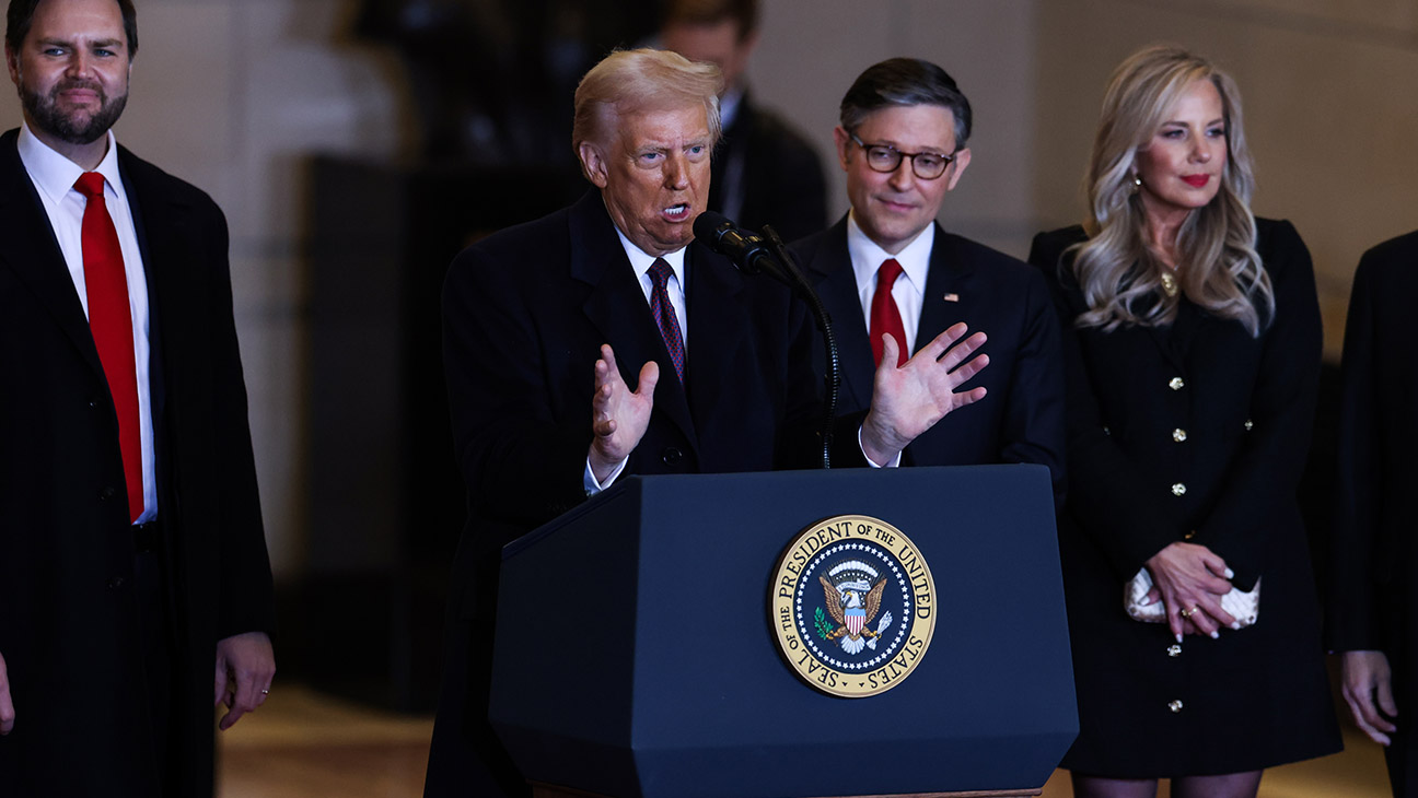 U.S. President Donald Trump speaks to the crowd alongside Vice President JD Vance (L), House Speaker Mike Johnson (R-LA), his wife Kelly Johnson, and House Majority Leader Steve Scalise (R-LA) in the VIP overflow viewing area in Emancipation Hall after his inauguration at the U.S. Capitol on January 20, 2025 in Washington, DC.