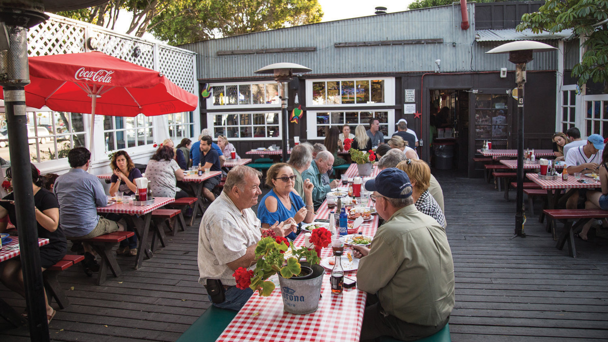 Patrons on the patio of the former Reel Inn restaurant